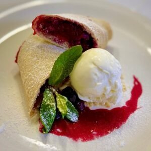 Cherry strudel with ice cream